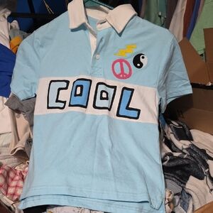 Kids Light Blue Polo Shirt with Fun Graphic